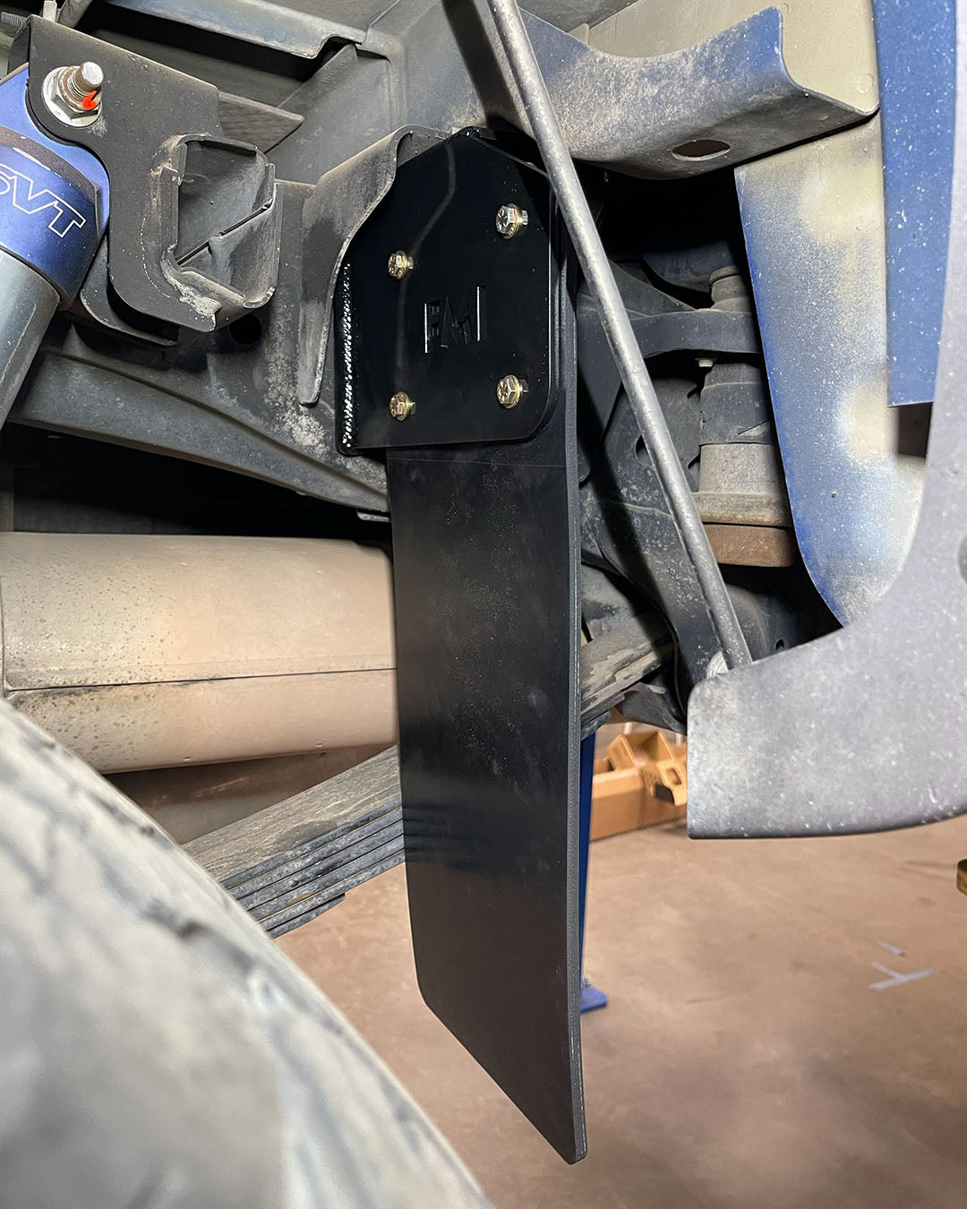 2010-2014 Ford Raptor rear shock guard frame mount with heavy-duty rubber mud flap