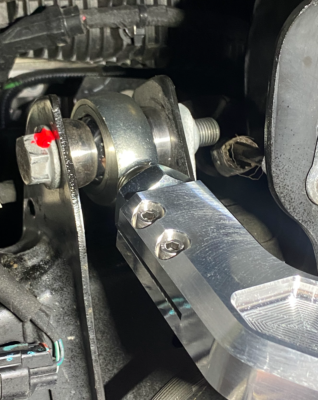 close up of FK uniball and stainless steel spacers on 2027 Ram TRX billet upper control arm