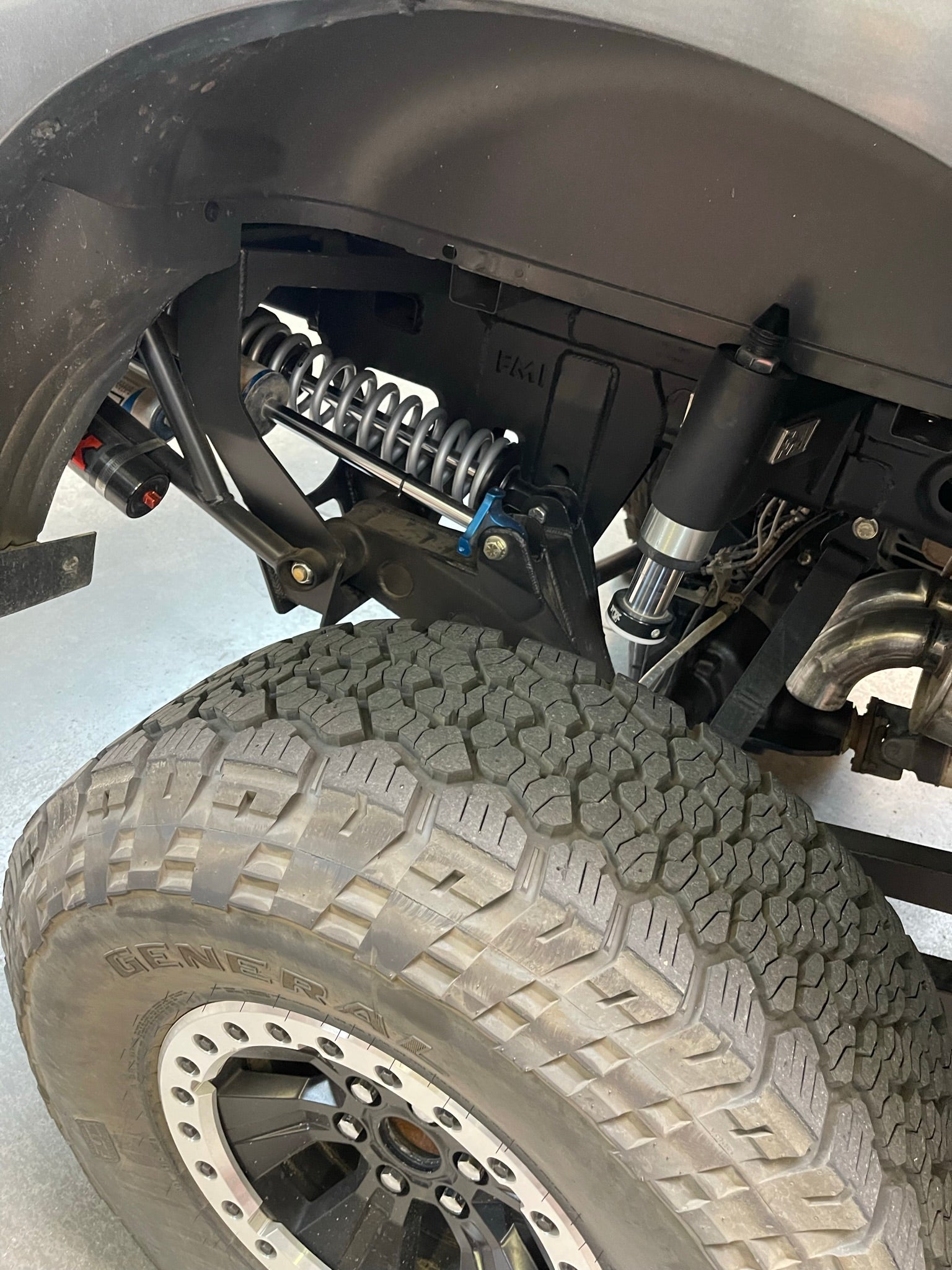 Raptor 5 link rear suspension kit with canitleaver provides over 19" of wheel travel in the rear.  Uses the stock live valve shocks or you can upgrade to a full 3" external bypass too.  The kit has a 12" coil over shock for the main spring to allow any spring rates you can imagine