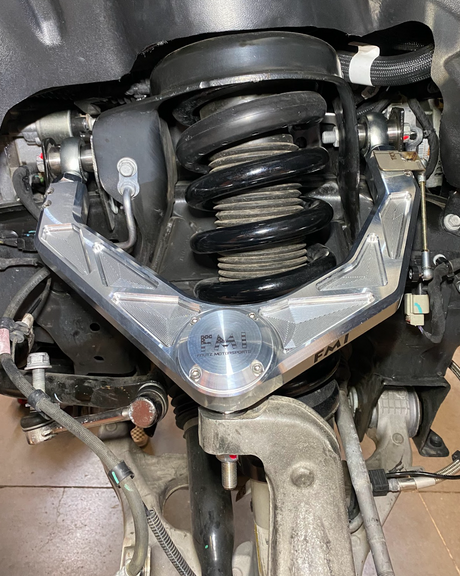 Foutz Motorsports billet aluminum upper control arms installed on a 2027 Ram 1500 SRT TRX front suspension