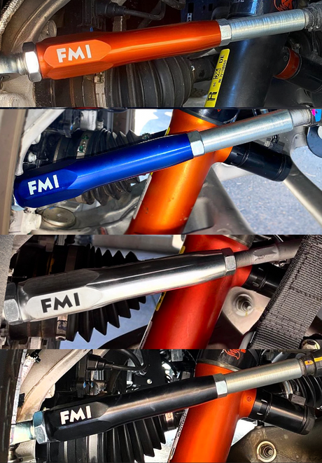 Four FMI billet half tie rods installed on Ford Raptors in FOX Orange, blue, raw and black anodized finishes