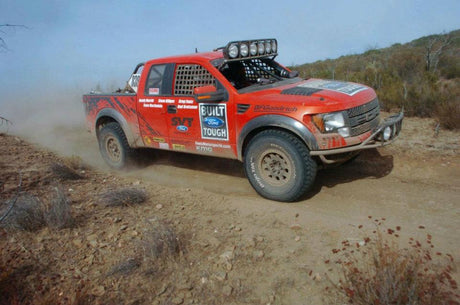 The Orignal Raptor R race truck at the Baja 1000 driving to the finish line during filming of the "Raptor Born in Baja" documentary