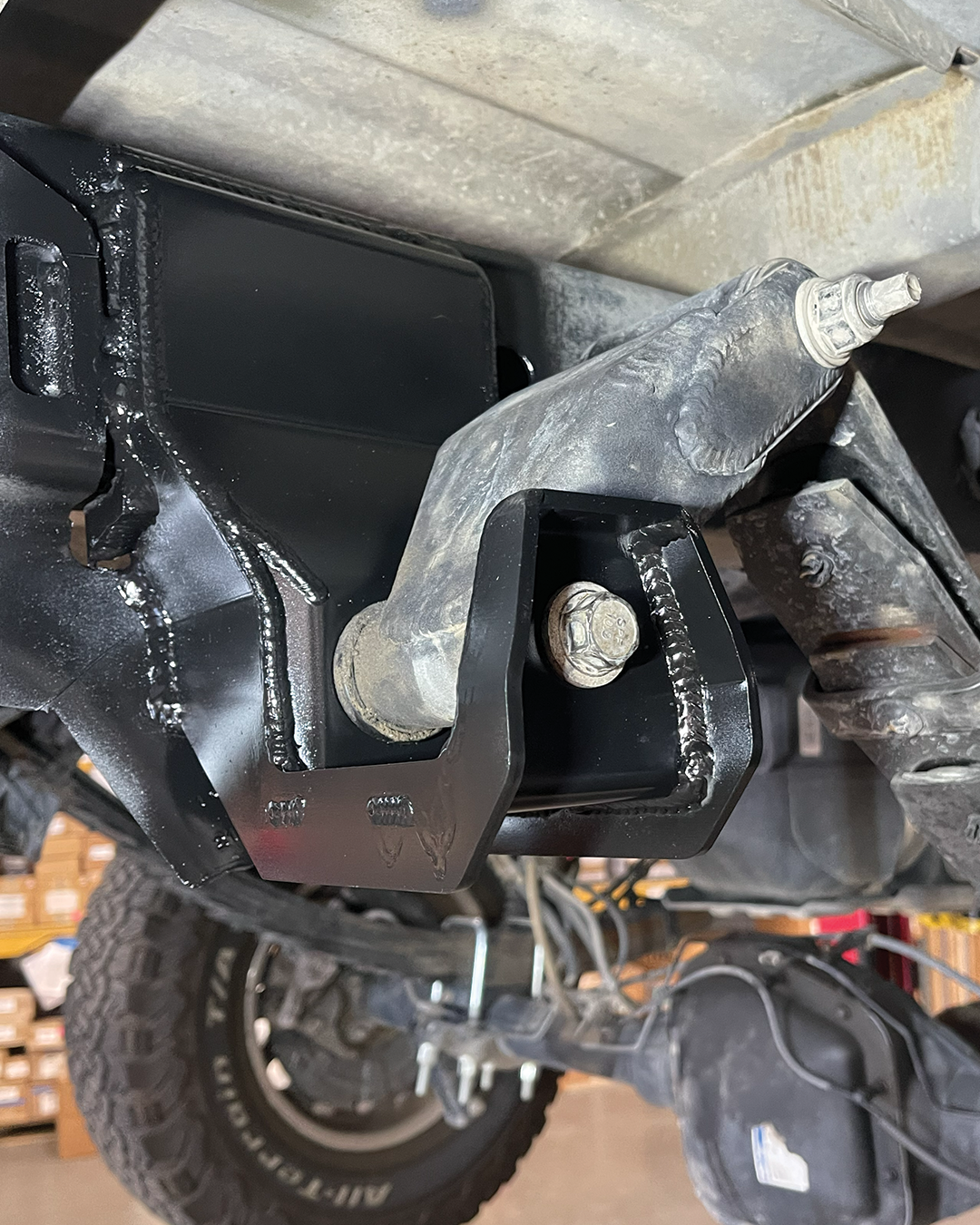 Fabricated Rear Shackle Hanger installed in Stock Location on 2010-2014 Gen 1 Raptor 