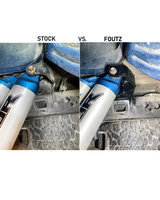 2017-2018 Ford Raptor Gen 2 rear shock  reinforcement kit showing factory mount and Foutz support plate bracket installed