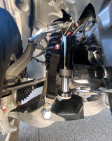 passenger side of 2025 Ram RHO with a Front Limit Strap & Bump Stop installed on a Stock Lower Arm