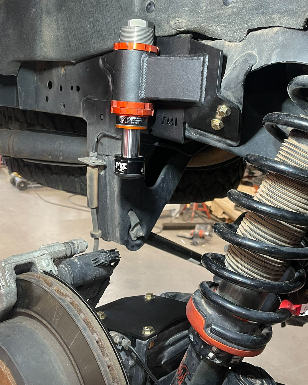 Ranger Raptor rear bump stop kit installed on rear suspension