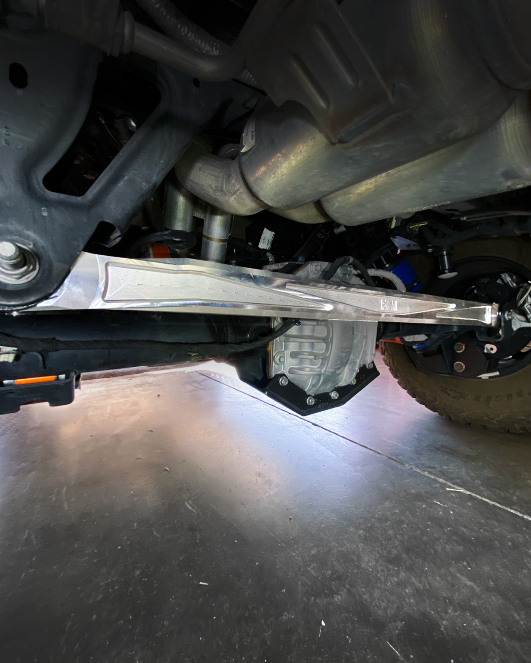 Raw billet panhard bar from below at a side angle, Bronco Raptor rear axle in frame