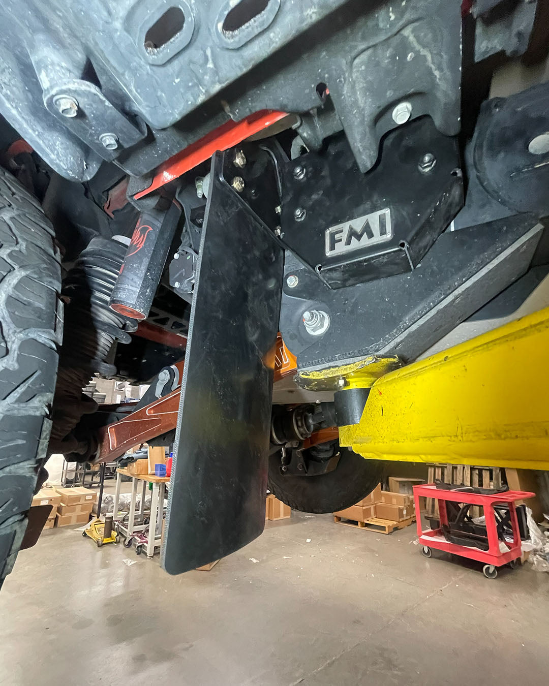 Bronco Raptor mud guards reducing rock chips and debris from aggressive tires