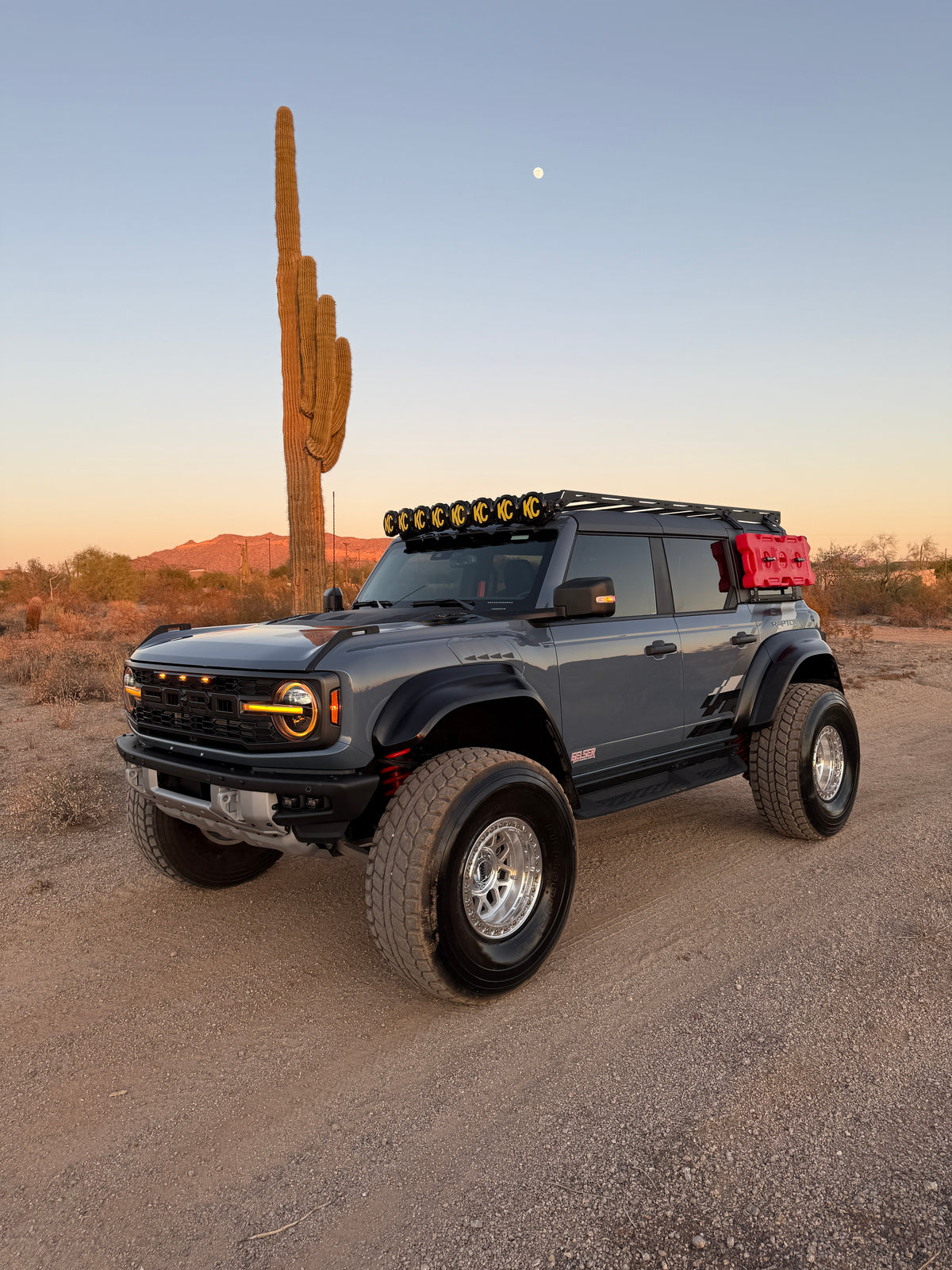 Ford Bronco Raptor front view in the desert on Geiser Off-Road front and rear progressive lift springs