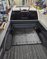Simple Bed Organizer main section deck plates installed at the front of a 2017-2026 Ford Super Duty bed